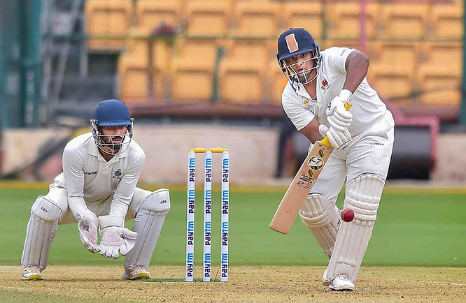 Sarfaraz Khan finished the Ranji Trophy 2021-22 season as the top run-scorer (982 Runs) _ Walking Wicket (Images_ ©Twitter_X)